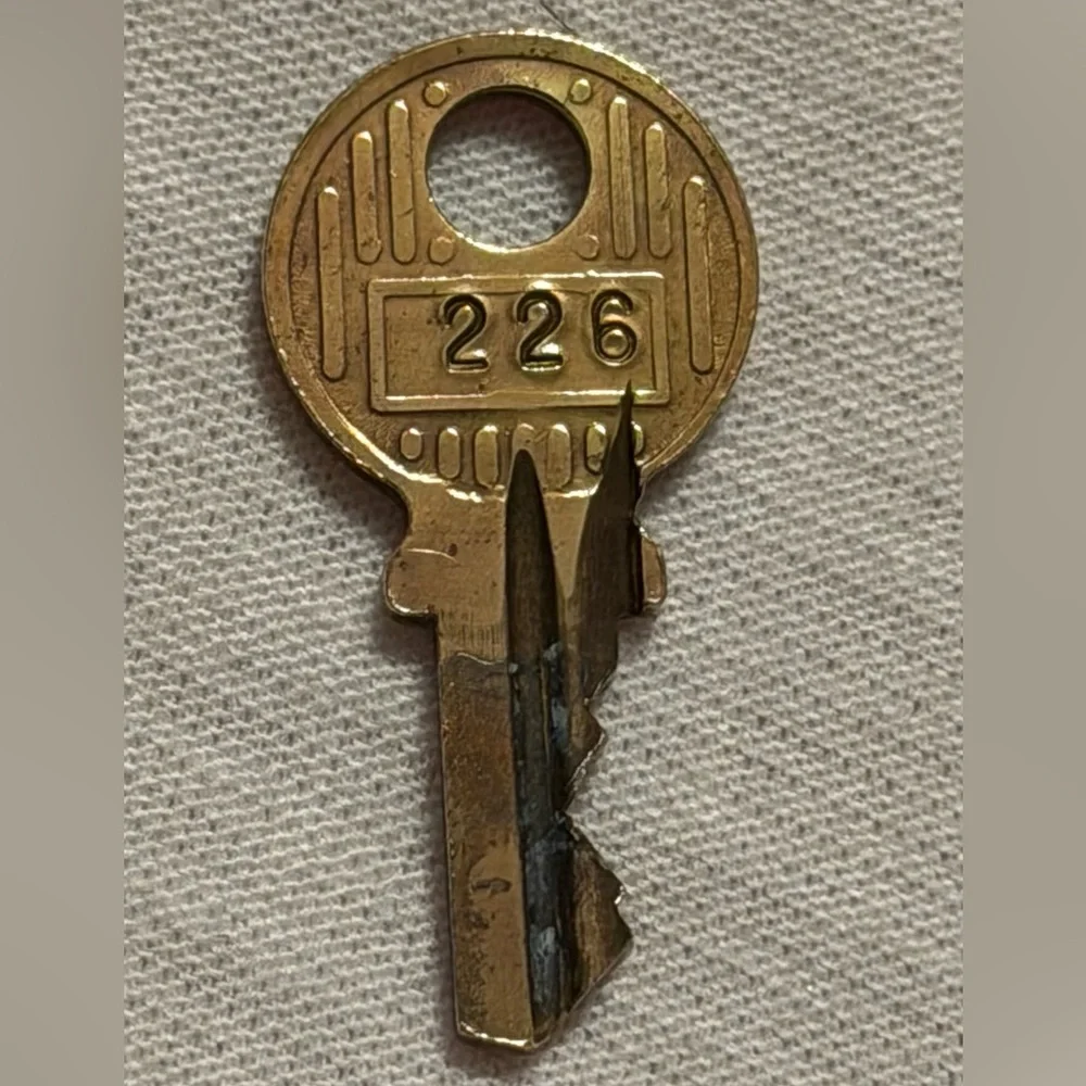 Louis Vuitton Gold Padlock with Key